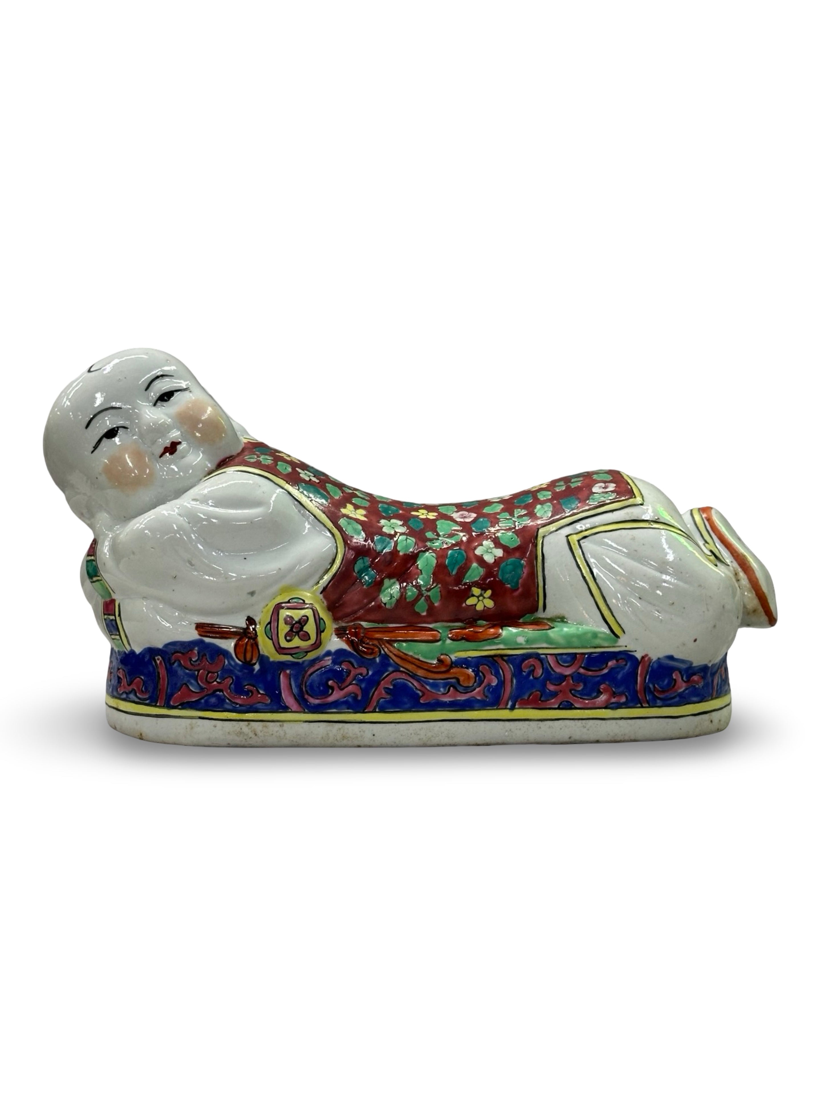 20th century Reclining Boy porcelain pillow