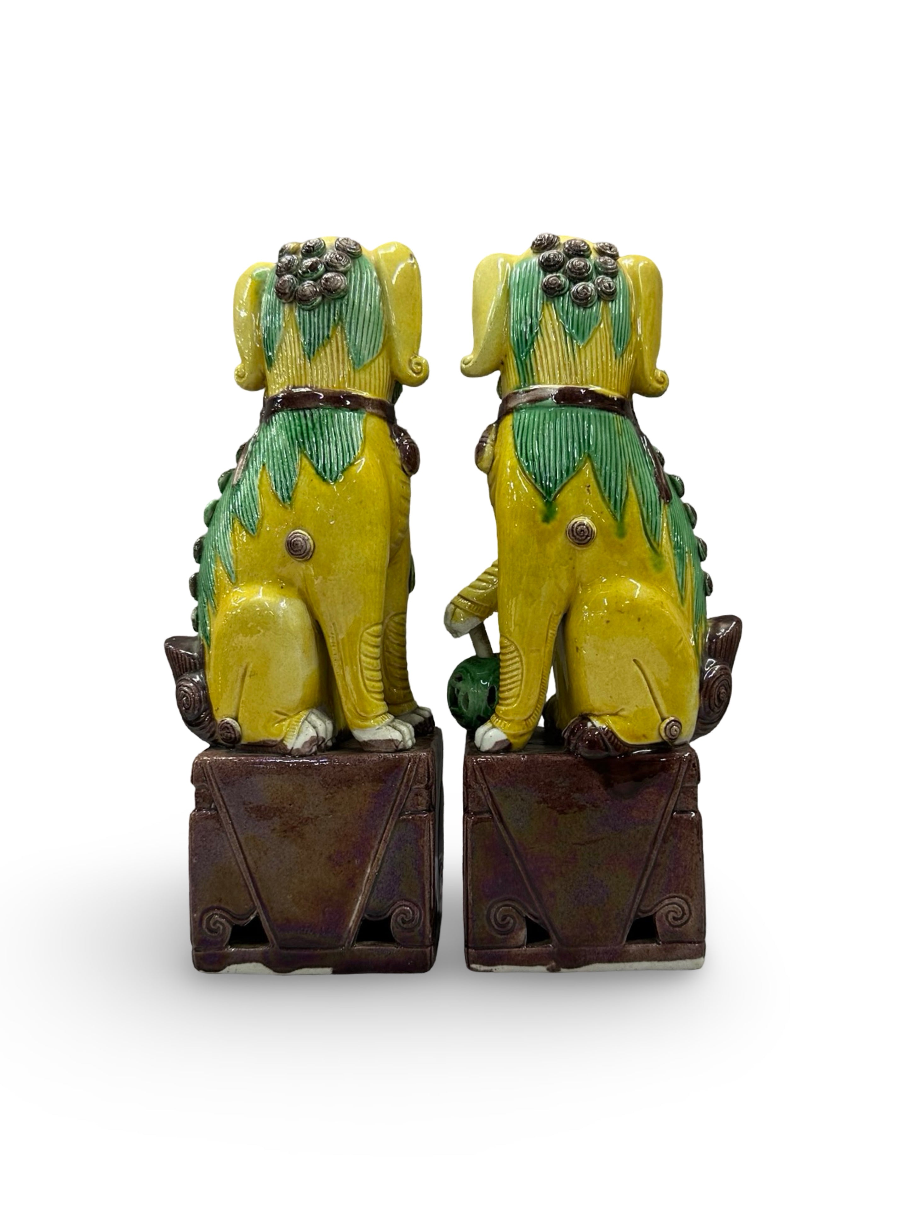 20th century Chinese Foo Dog Statues - Yellow & Green Sancai Glaze - Pair